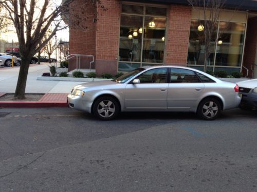 2003 silver gray, black leather interior and mahogany trim, 3.0l