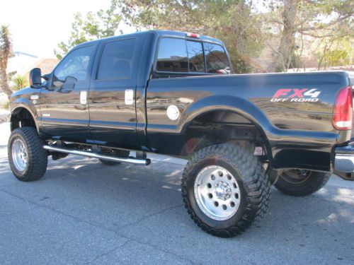 2006 ford f250 powerstroke 4x4, lifted, king ranch, short bed, 54k
