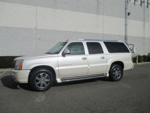 4x4 7 passanger third row seating chrome wheels dvd entertainment