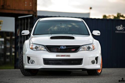 White 2012 subaru sti