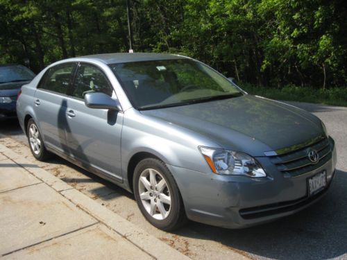 Light blue toyota avalon xl 4-door sedan in excellent condition