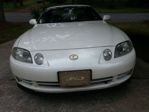 Pearl white/tan interior with gold package &amp; gold dual exhaust