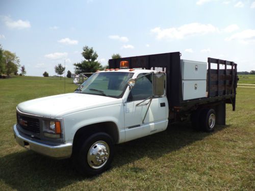 1999 GMC C3500 6.5L Diesel 76k low miles liftgate utility stake truck flatbed, image 2