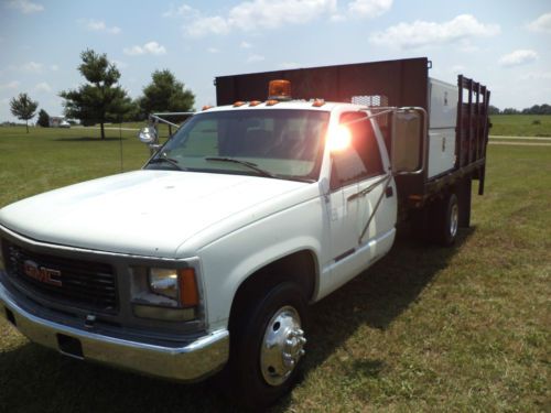 1999 GMC C3500 6.5L Diesel 76k low miles liftgate utility stake truck flatbed, image 12