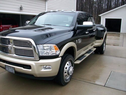 2012 ram 3500 nav,rear cam,rear dvd,laramie longhorn extended mega cab