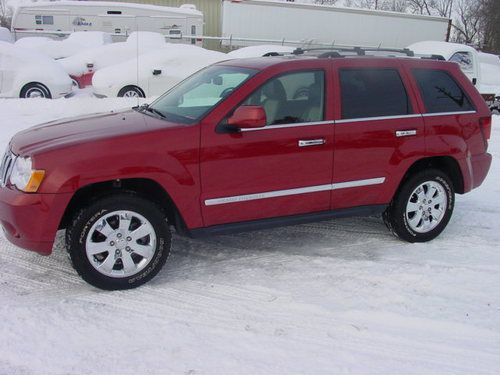 2010 jeep grand cherokee limited,3.7,awd,sunroof,leather, backup camera, nav