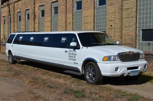 1998 white lincoln navigator - seats 20 - 200 inches in length - new paint job