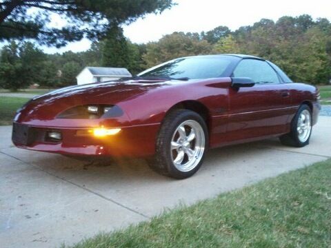 1995 chevy camaro z28, bergundy, 102k miles, one owner.