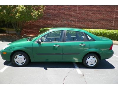 Ford focus lx new tires all around dual airbags cold a/c child locks no reserve