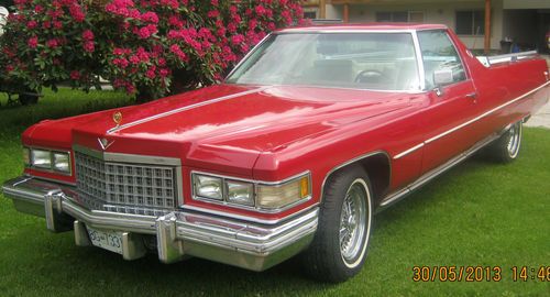 1976 red cadillac deville/el camino