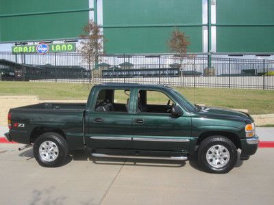 Look at this 2005 gmc sierra flawless condition crew cab z71  58k  and warranty