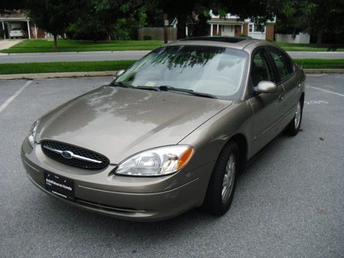 2003 ford taurus sel deluxe,leather,roof,cd changer,all option,xtra clean,nr!!!!