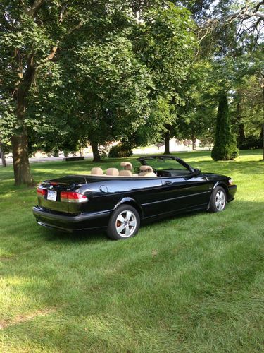 Put the top down &amp; let the wind blow!  classy black convertible w/tan interior