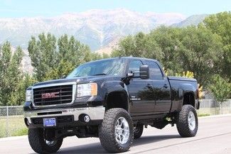 2007 gmc sierra 2500hd crew cab slt (8")fabtech lift duramas amp boards 1-owner