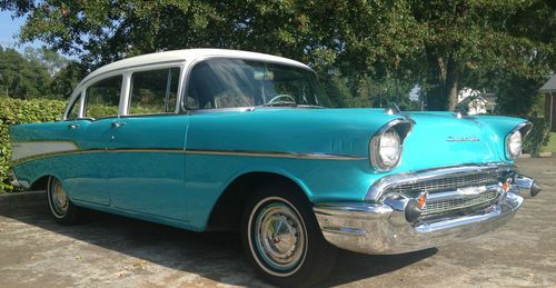 1957 chevy 4 door base sedan 6 cylinder tropical turquoise with continental kit