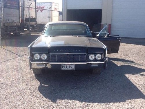 1967 lincoln continental black suicide doors