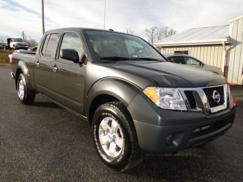 2013 nissan frontier sv 4x4 crew cab, rebuilt salvage title repaired damage