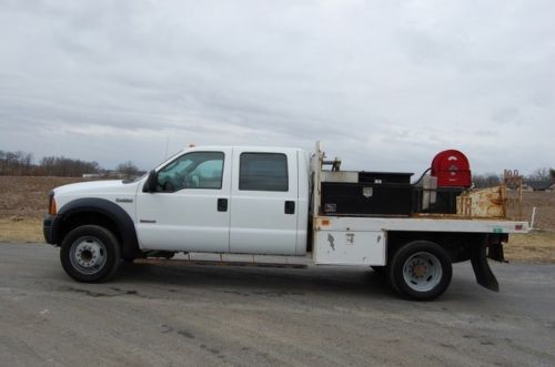 F450 crew cab flatbed 3k miles on new ford diesel engine fuel cell tool boxes