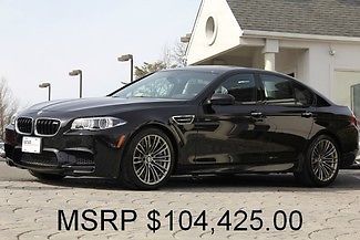 Black sapphire metallic auto m dct msrp $104,425.00 only 3,978 miles like new
