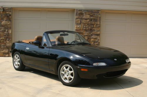 Mazda miata mx-5, black with tan convertible top and tan interior