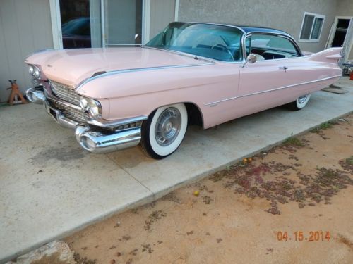 1959 cadillac pink coupe- western dry car 1960 eldorado hubcap