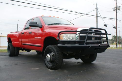 6 speed 5.9 liter turbo diesel slt 4x4 quad cab dually lifted rear bags hurry