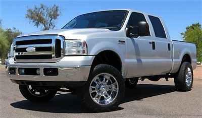 No reserve 2006 ford f250 lariat crew  diesel lifted 4x4 low mile very clean!!!!