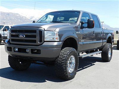 Ford crew cab sport 4x4 powerstroke diesel custom lift wheels tires leather tow