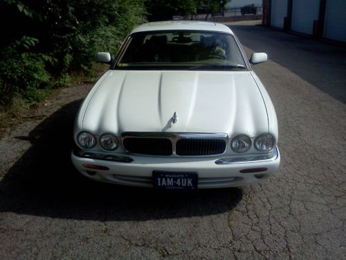 Gorgeous pearl white sedan l