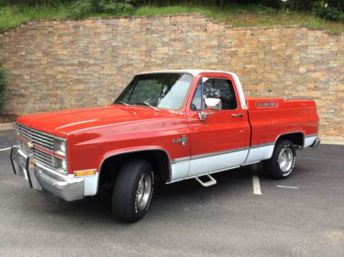 Nice 1984 chevy silverado. fresh motor, transmission and red paint.