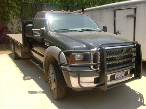 Black 2005 ford f450 xl super duty flatbed