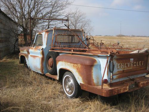 Chevrolet  c-10 long bed step side, light blue.