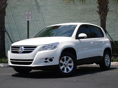 Sharp tiguan - power windows - power locks - auto/manual transmission - warranty