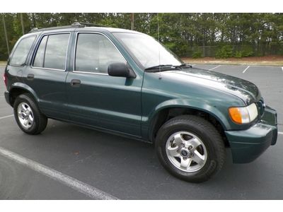 Kia sportage 4x4 georgia owned new tires alloy wheels cold a/c no reserve only