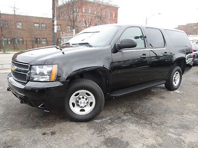 Black 2500 ls,4x4,9 pass,boards,dual air,112k hwy miles,ex-govt,nice