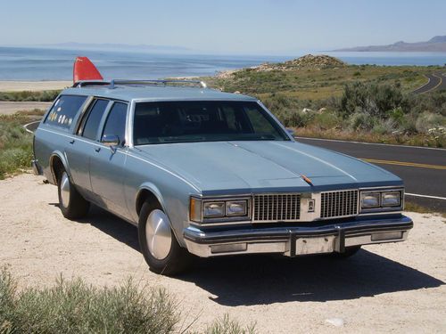 1987 oldsmobile custom cruiser station wagon, great runner, surfer  fun,fun,fun.