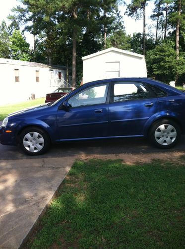 2004 suzuki forenza s sedan 4-door 2.0l