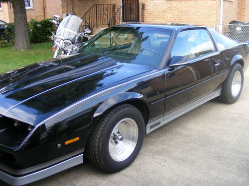 Black 1983 z 28 camaro 9000 original miles garage kept.very good condtion 350lt1