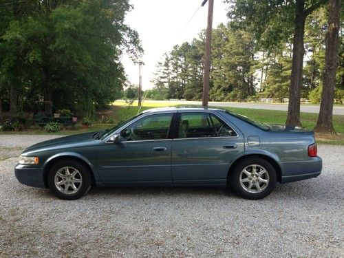 Beautiful steel blue sts cadillac fully loaded w chrome rims