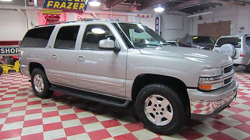 04 suburban lt 4x4 bose dvd heatd lthr 1 ownr xtra cln new tires needs nothing