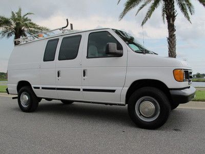 Ford e250 cargo van - with  bins, shelves ac power inverter and ladder racks