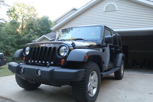 2010 jeep wrangler unlimited islander edition 4-door 3.8l automatic