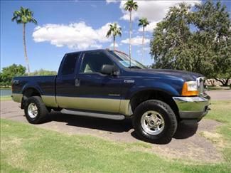 2001 blue 7.3 - diesel -- 4x4 - 95k -- miles -- lariat - gottruck.com