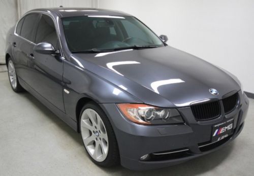 Graphite metallic bmw 335xi 3.0l twin-turbo 4x4 awd clean carfax ..we finance