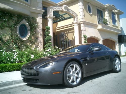 Like new, never registered 2007 aston martin vantage v8, only 9xx miles, nr