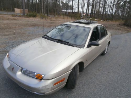 2000 saturn sl2 economical 4 cyl  gas saver 5 speed gold sunroof no reserve