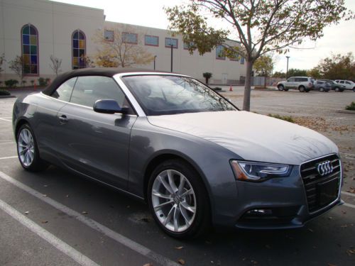 2014 audi a5 2.0t premium quattro convertible in new condition, only 100 mi.