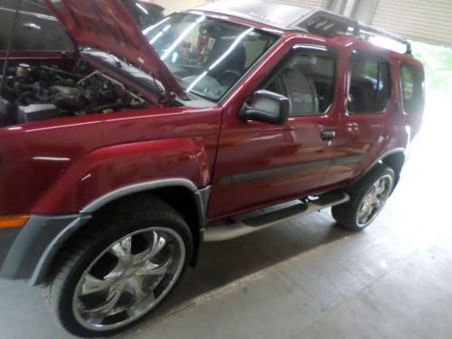 2003 nissan runs &amp; drive good it has a clear title with 22&#034; chrome rims