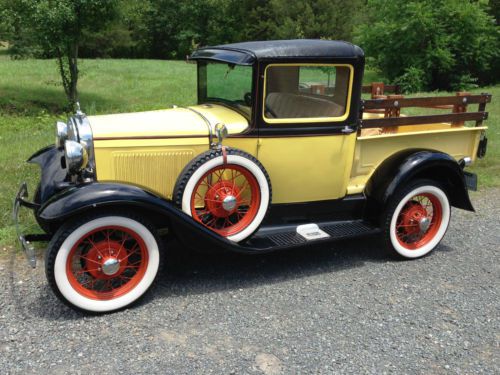 1930 model a ford pickup truck. vintage ford, real steel. side mount spare.