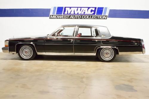Red leather~d&#039;elegance~wire wheels~only 52k mls~two owner~